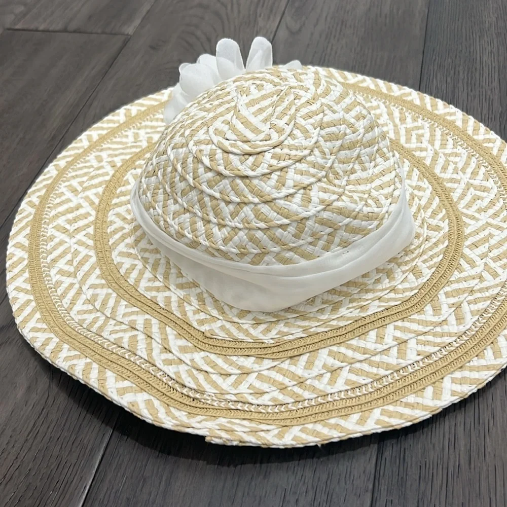 Infant stylish brim sun hat with sheer like floral sash.